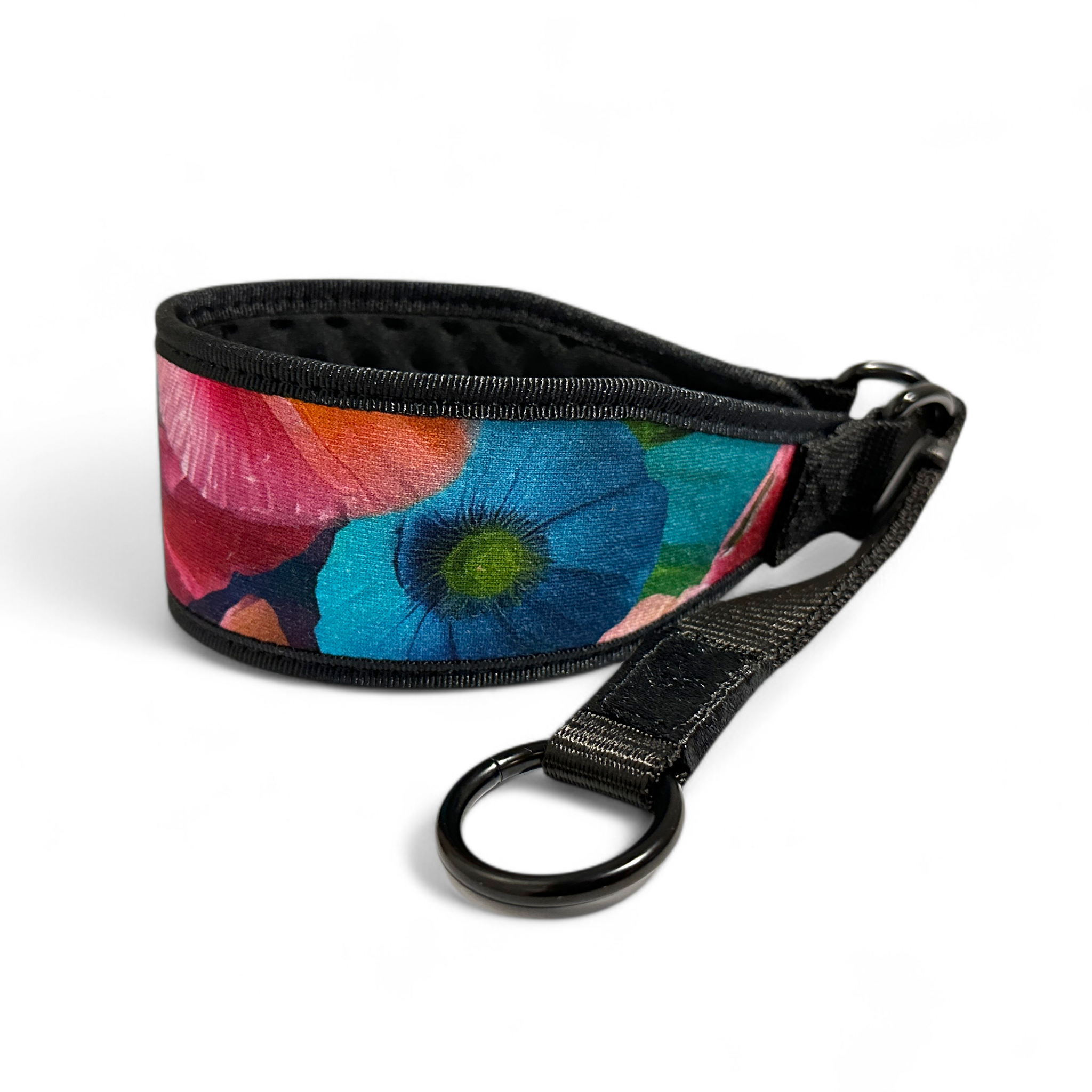 Colorful floral-patterned dog collar with black handle on a white background