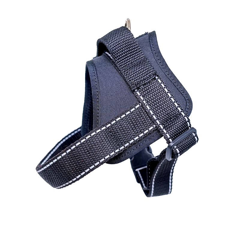 Black dog harness with white stitching on a white background