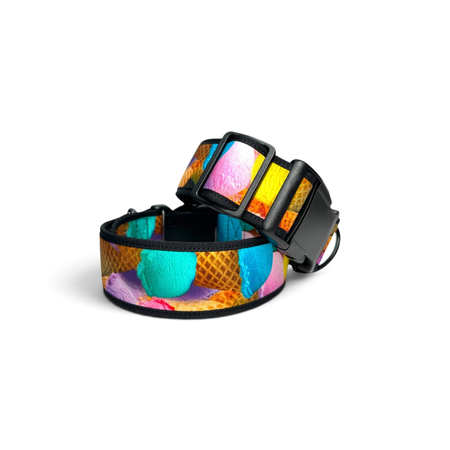 A dog collar featuring a colorful ice cream scoop and waffle cone pattern, with black hardware and a black adjustable buckle, shown on a plain white background.
